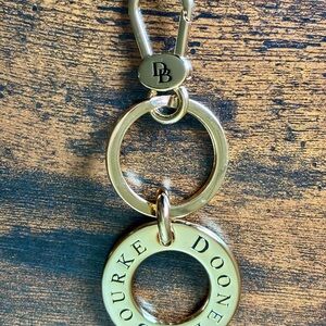 Dooney & Bourke Gold Plated Signature Keychain